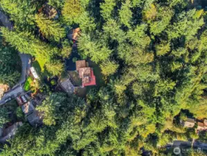Top down view shows the expansive property surrounding the home.