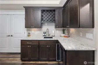 Kitchenette in Basement with mini-fridge and sink
