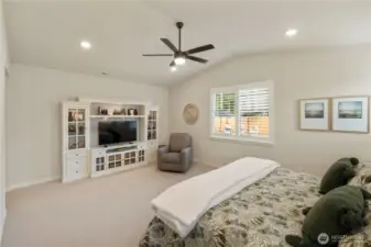 Luxurious primary suite with walk-in closet