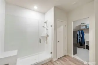 Spa-inspired bathroom with dual sinks and walk-in shower