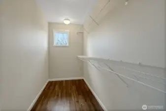 Huge walk in closet in primary bedroom