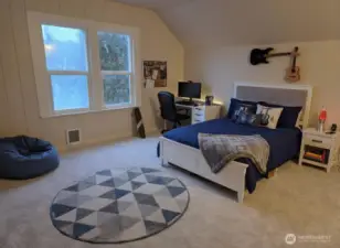 Upstairs bedroom #2 is virtually staged