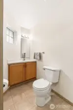 Powder room 1/2 bath on main level.