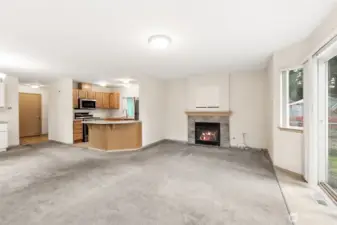 Kitchen with eating area and open floor plan with so much daylight.