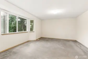 primary bedroom w full bathroom shower and soaking tub