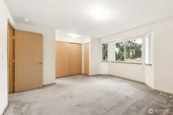 Closets in primary bedroom & full bath