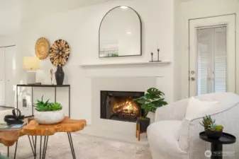 Wood burning fireplace with access to your private patio.