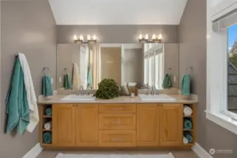 The bathrooms have vaulted ceilings, marble counters, and soar with natural light.