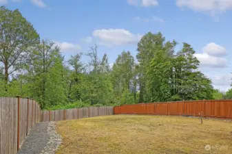 Huge fully fenced yard that backs up to greenbelt.