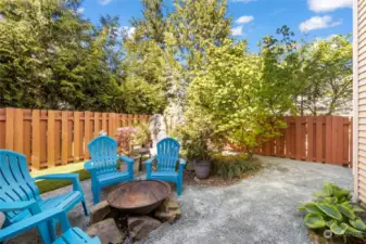 firepit and seating area in backyard, privacy in the backyard is amazing, you are shielded from the street view with the mature landscaping and trees, yet still receive the sun throughout the day. Large space here!