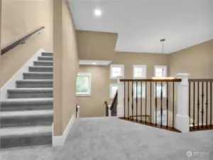 Balcony area overlooking the formal dining room/living room area and stairs leading up to the 3rd level Rec Room.