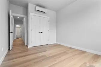Bedroom #2 with view into bathroom.