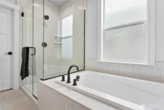 Nice sized soaking tub.
