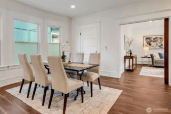 The large bright dining room makes dinner or game nights a joy!
