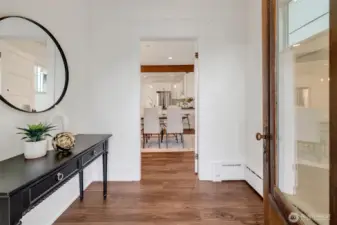 Upon entering find yourself in a fabulous foyer with room to hang and coats and kick of your shoes.