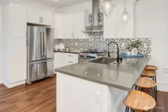 A chefs kitchen greets you, whether your a gifted cook or simply like to entertain with takeout, this kitchen is a true delight!