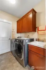 Laundry with extra storage & Sink!