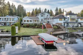 Aerial view highlighting deep-water moorage and exceptional lakefront living