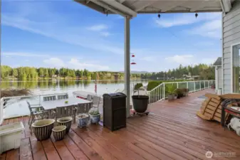Spacious deck overlooking the water, ideal for entertainment