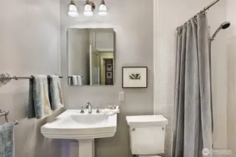 A full bath with updated flooring.