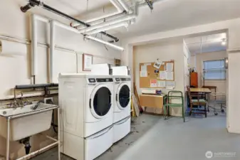 Complimentary laundry. The door to take down to the laundry is conveniently close to unit 202.