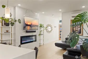 Cozy living space with electric fireplace.