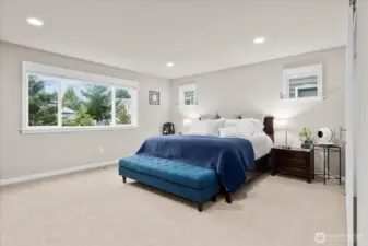 The primary bedroom is a true oasis large and enough for all your furniture. With two walk-in closets, double door entry and an en-suite bathroom - this space has all the room you need to relax and unwind after a long day.