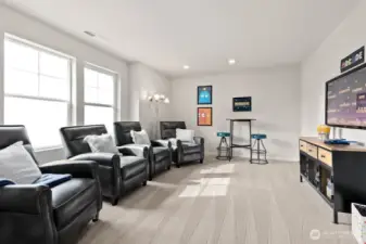 Large bonus room perfect for a media space, game room, or playroom. Photo is representational. Actual home is under construction. Colors, materials, and features may vary. See site agent for details.