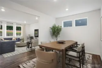 Formal dining area perfect for dinners and hosting events. Photo is representational. Actual home is under construction. Colors, materials, and features may vary. See site agent for details.