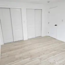 main floor bedroom with double closets