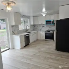 New quartz counters, appliances and room for dining