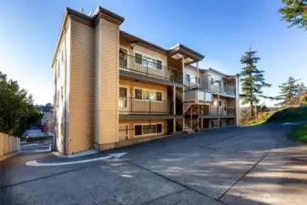 Designated back of building parking  space. Easy access to condo at middle of building.