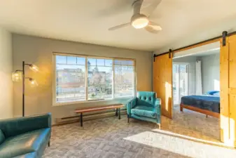Entrance to west facing bedroom with accent rail doors