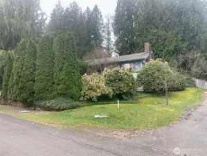 Survey stake at NE corner of property