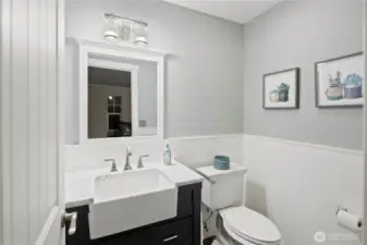 Powder room off the main living/kitchen