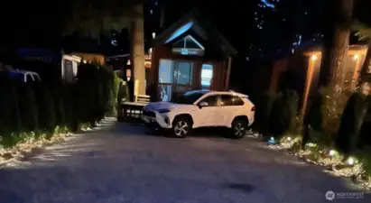 Night with lights in driveway