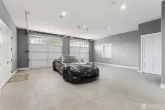 2 bay tandem garage with office, kitchenette and a 3/4 bath inside.