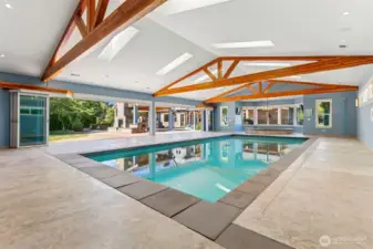 Charming pool house, complete with a self filling pool and hot tub, a dedicated ballet studio and professional-grade dog kennels. Open the expansive bifold glass doors, inviting the beauty of the outdoors in; where you can go relax by the outdoor fireplace.