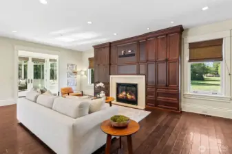 Cozy living room just next to the atrium and along side the kitchen.