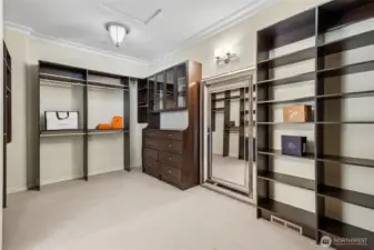 Dreams do come true in this over sized primary bedroom closet!
