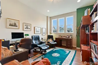 Off the kitchen is a den/office area.