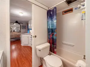 Full bath with bathtub.