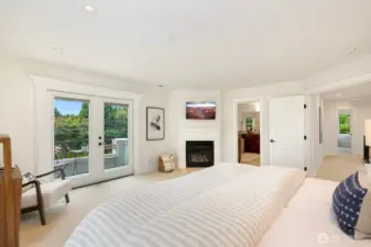 Primary is complete with a private balcony, gas fireplace, 5pc bath, and walk-in-closet.