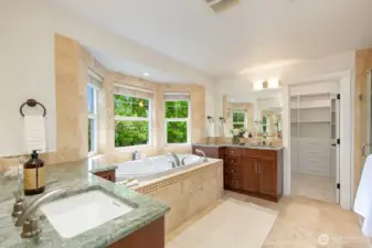 Primary bath. The water closet and walk-in shower are to the right in this photo. Heated floors here too!