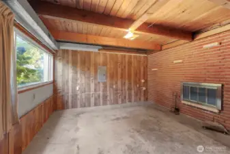 Basement front living space with fireplace