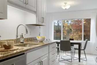 A soothing palette of cool tones unites the spaces, giving the home a fresh and harmonious feel.
