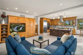 Family room right off kitchen with built-ins.