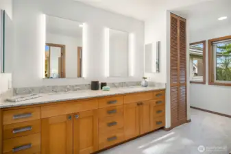 Open sink area for these 2 bedrooms with lots of storage.