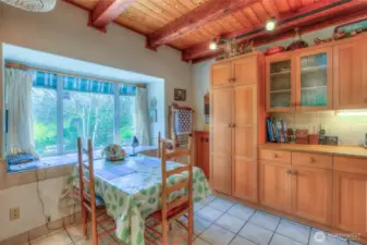 Fig trees almost ready to wake up are well placed outside the kitchen.