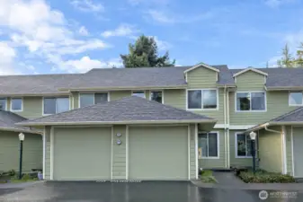 3935 NW Fairway Lane Bremerton, WA. 2 bed, 1.5 bath condo with a 1-car garage.